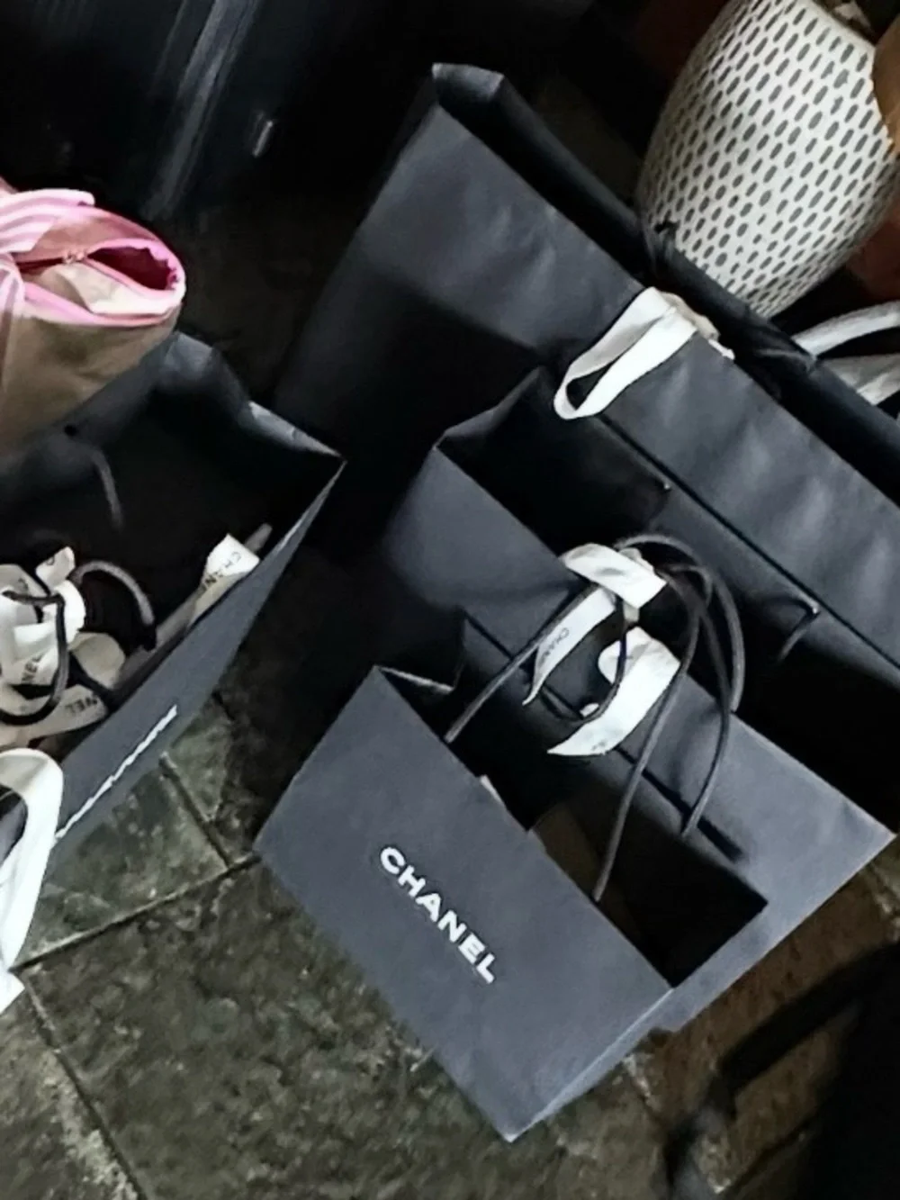 CHANEL Black Shopping Bags with White Camellia Accents